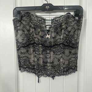 Black lace sheer boned Victoria's Secret corset with a tiny pink bow. Small